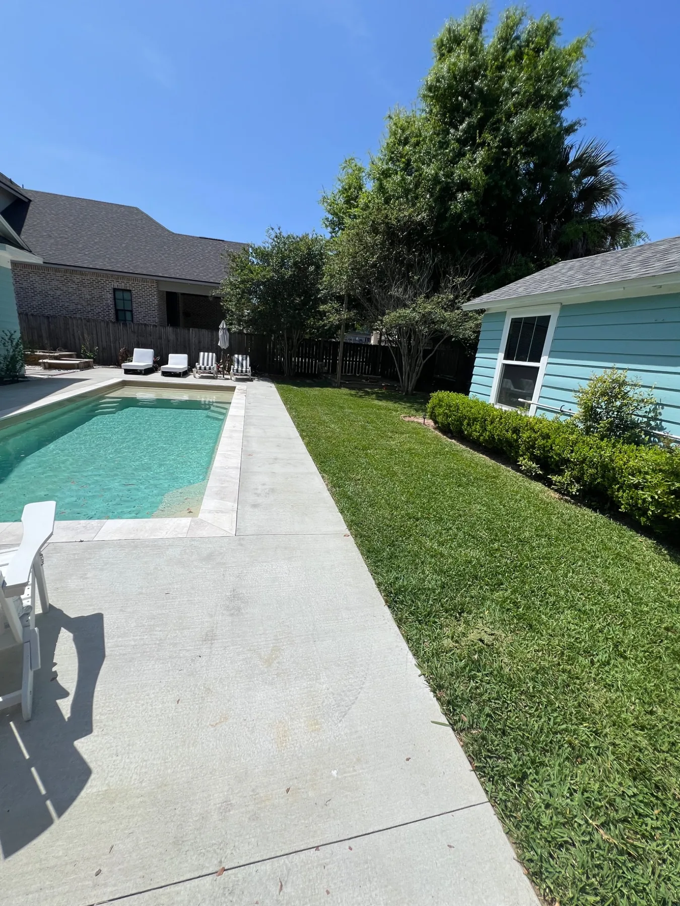 Poolside lawn maintenance