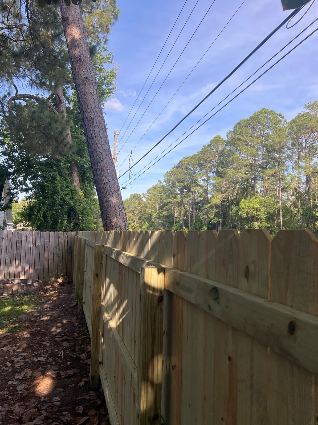 Backyard privacy fence installation